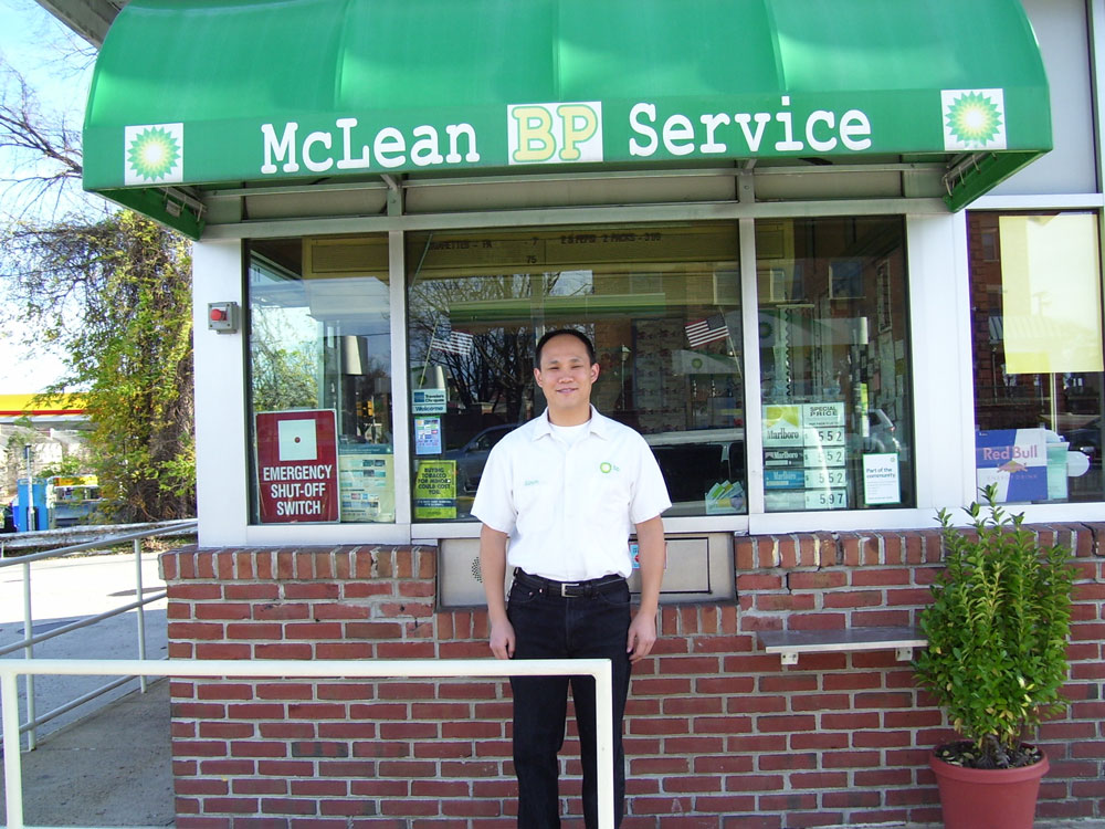 Mclean-BP-Manager-2 Manager standing in-front of office